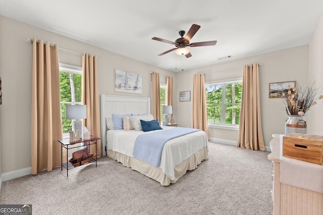 bedroom featuring ceiling fan and carpet flooring