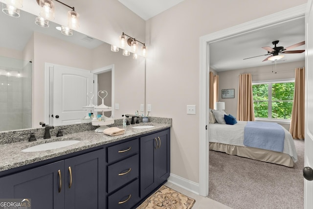 bathroom featuring vanity and ceiling fan