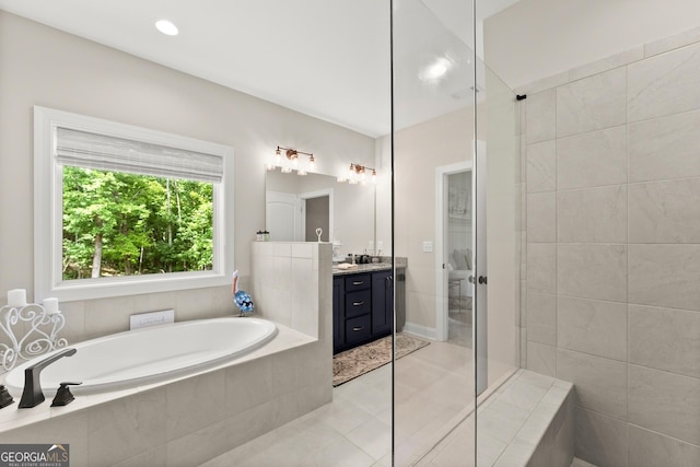 bathroom with vanity, separate shower and tub, and tile patterned flooring