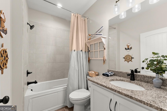 full bathroom featuring vanity, toilet, and shower / bath combo with shower curtain