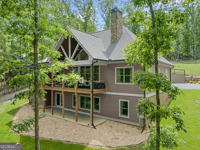 back of property with a patio area