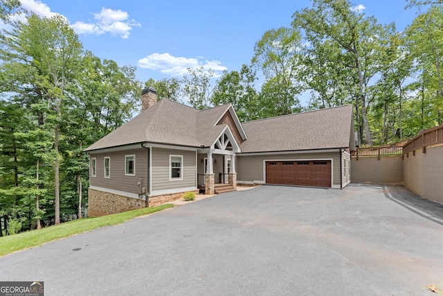 view of front of property with a garage