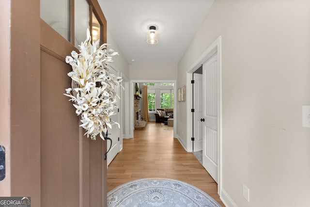 hallway featuring light hardwood / wood-style floors