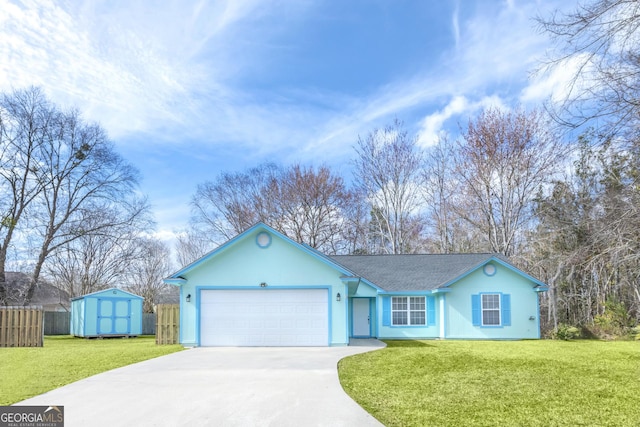 ranch-style home with a garage, a front yard, and a storage unit