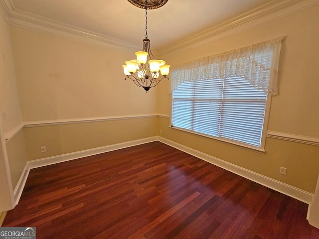 unfurnished room featuring crown molding, dark hardwood / wood-style floors, and a chandelier