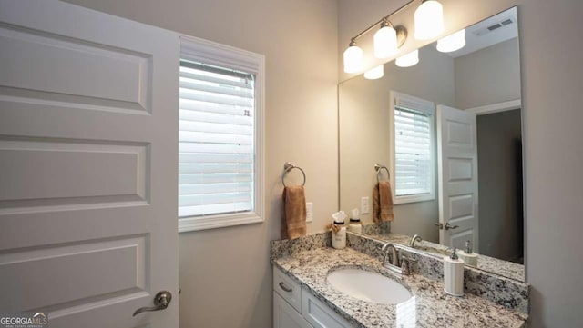 bathroom featuring vanity