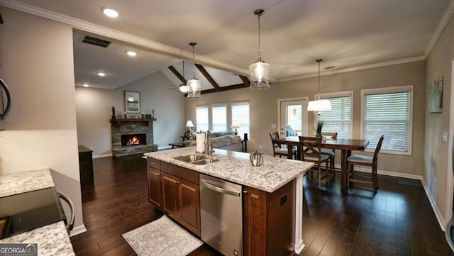 kitchen featuring pendant lighting, sink, a center island with sink, dark hardwood / wood-style flooring, and stainless steel dishwasher