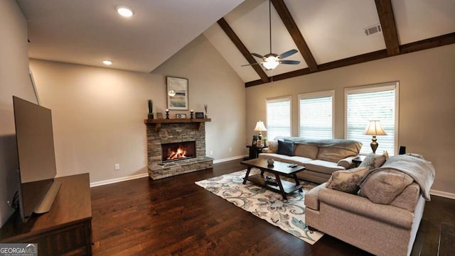 living room featuring beam ceiling, high vaulted ceiling, dark hardwood / wood-style flooring, ceiling fan, and a fireplace