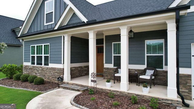 doorway to property with covered porch