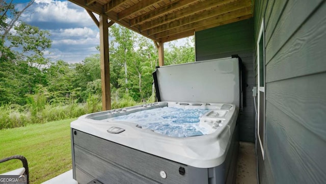 view of patio / terrace featuring a hot tub