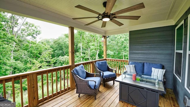 deck featuring an outdoor hangout area and ceiling fan