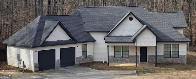 view of front of property featuring a garage