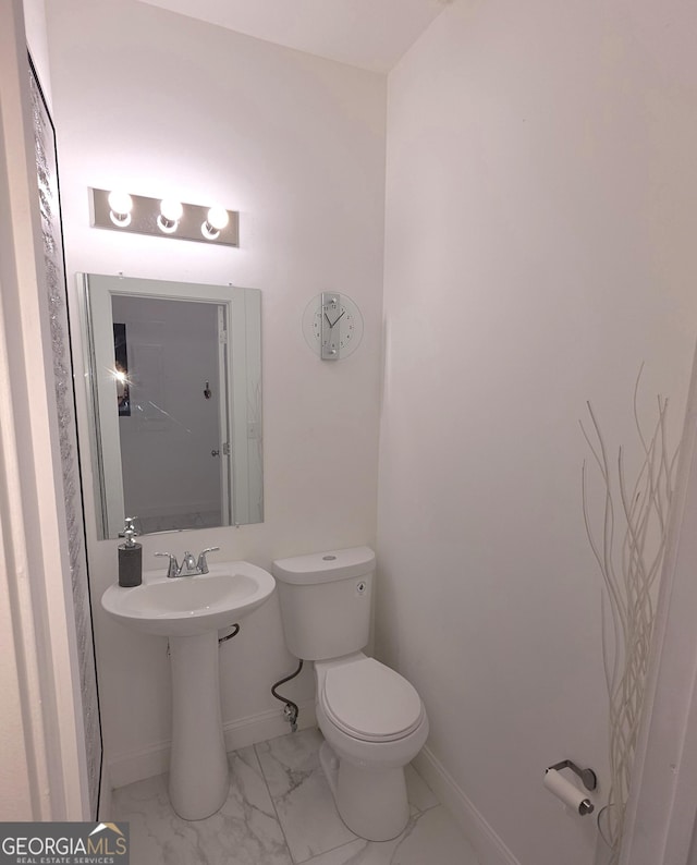 bathroom featuring toilet