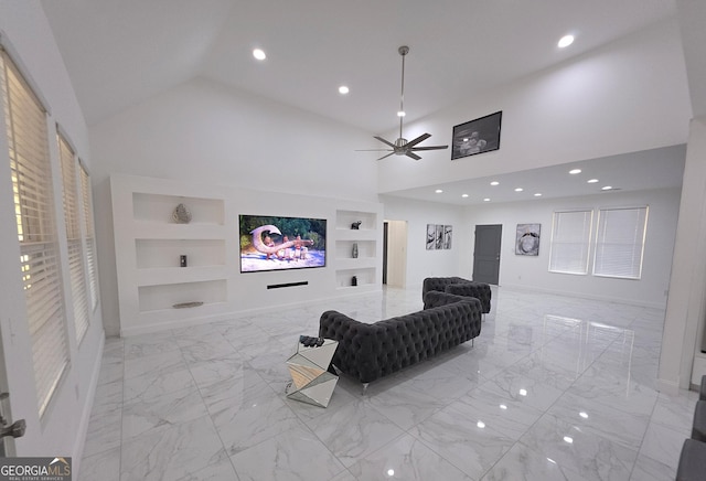 living room featuring built in shelves, high vaulted ceiling, and ceiling fan