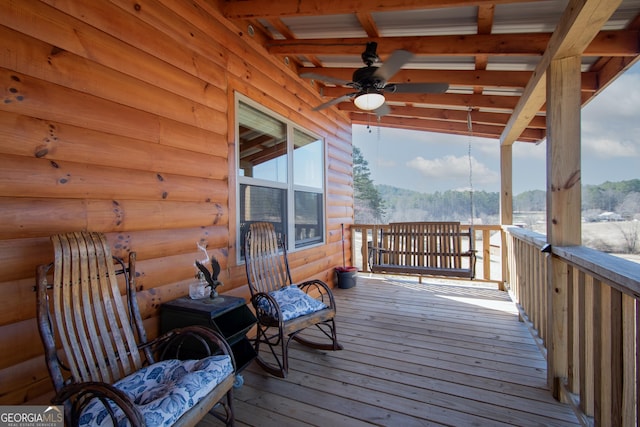 wooden terrace with ceiling fan