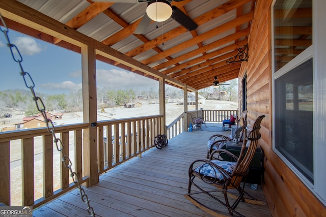 wooden terrace with ceiling fan