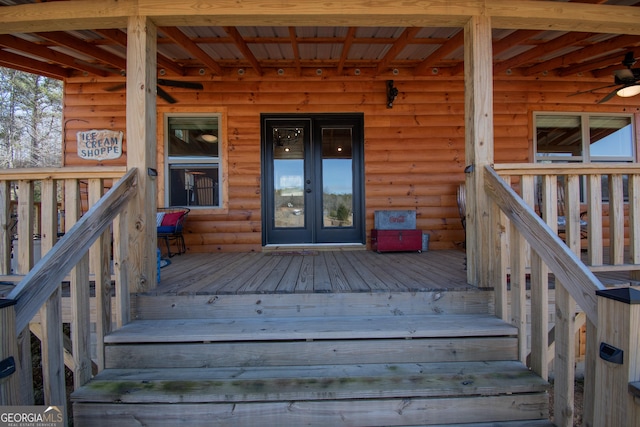 wooden deck with french doors and ceiling fan