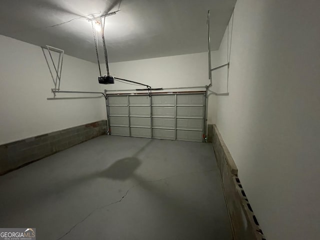 garage featuring a garage door opener