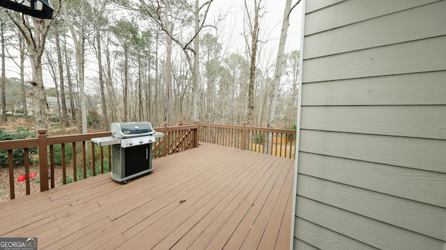 deck featuring a grill