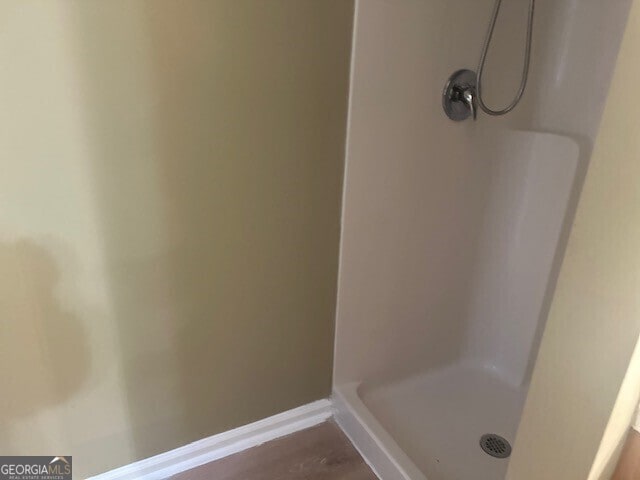 bathroom with walk in shower