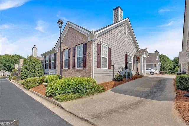 view of side of property featuring a garage