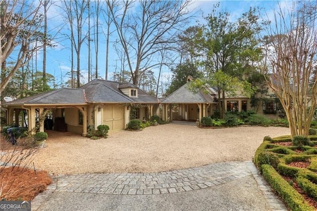 single story home with a carport