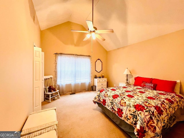 bedroom featuring lofted ceiling, carpet flooring, and ceiling fan