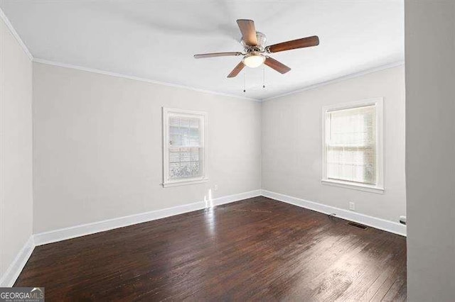 unfurnished room featuring ceiling fan, ornamental molding, and dark hardwood / wood-style flooring