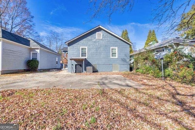 back of property featuring a patio area