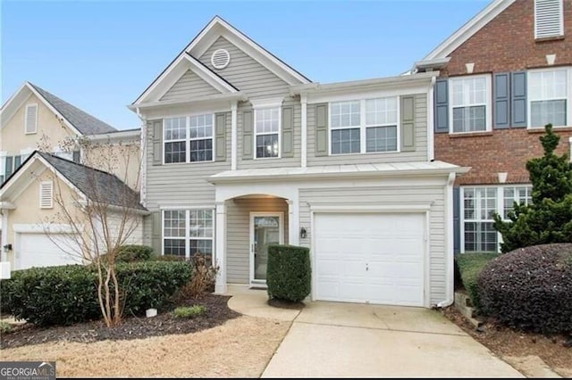 view of front of home with a garage