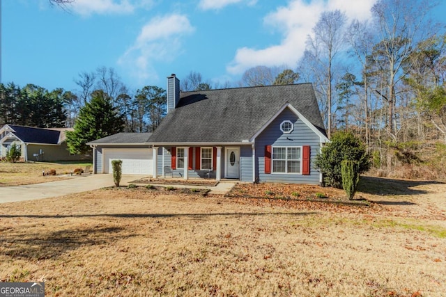 view of front facade featuring a garage and a front yard