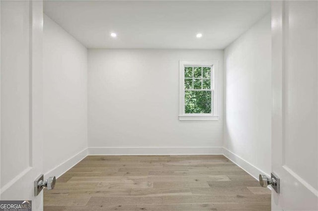 unfurnished room featuring light wood-type flooring