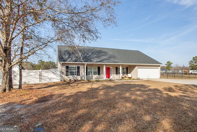 single story home featuring a garage