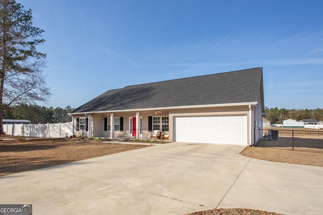 single story home with a garage and a porch