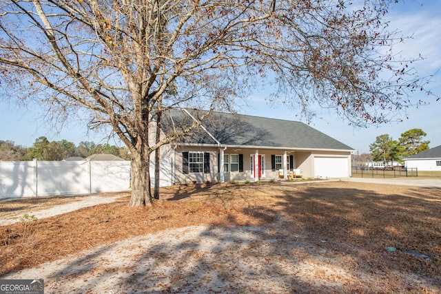 ranch-style home with a garage