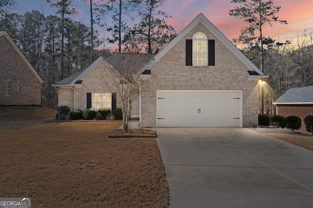 view of front of home with a garage