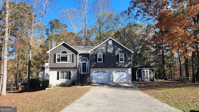 split foyer home featuring a garage