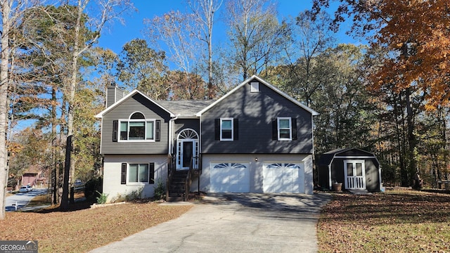 raised ranch featuring a garage