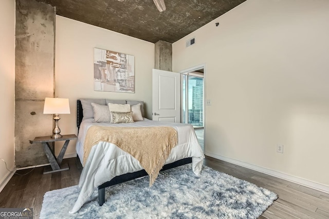 bedroom featuring hardwood / wood-style floors