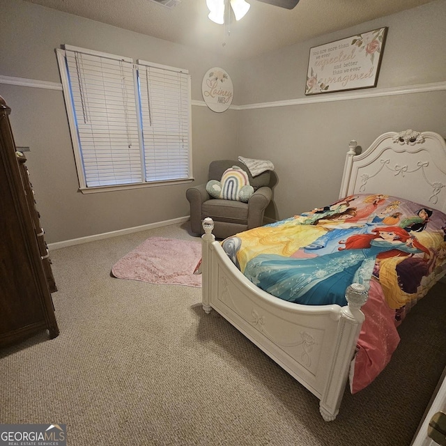 carpeted bedroom with ceiling fan