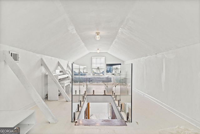 interior space with vaulted ceiling