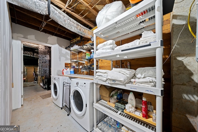 washroom with washer and dryer