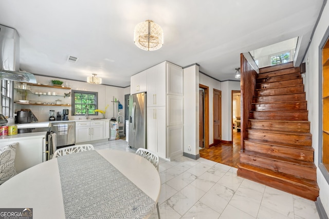 dining space with sink