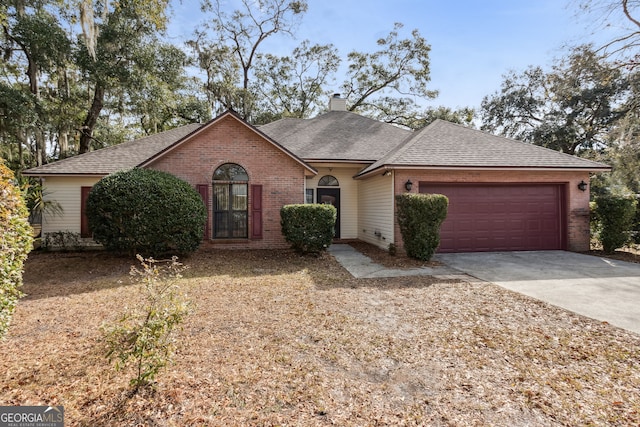 ranch-style home with a garage