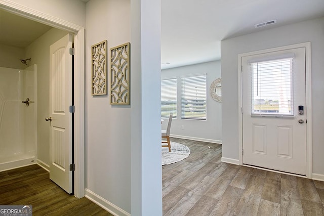 entrance foyer with light hardwood / wood-style flooring