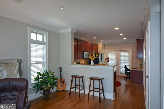 6422 Paulson, Atlanta, GA 30328 - kitchen with ornamental molding, appliances with stainless steel finishes, and dark wood finished floors