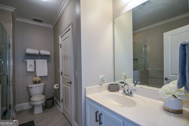 6422 Paulson, Atlanta, GA 30328 - bathroom featuring crown molding, visible vents, toilet, a shower stall, and vanity