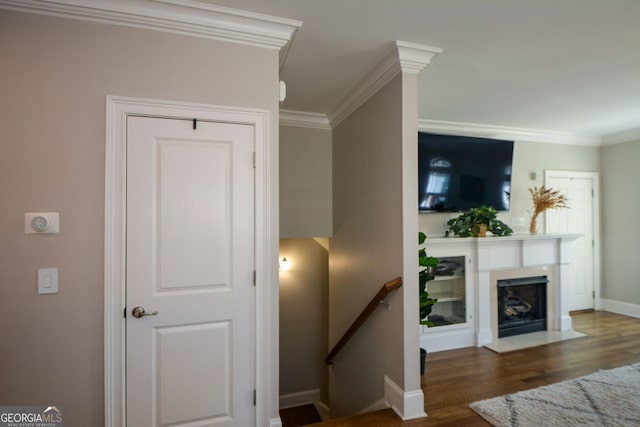 6422 Paulson, Atlanta, GA 30328 - interior space featuring ornamental molding, baseboards, a fireplace with flush hearth, and wood finished floors