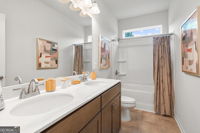 full bathroom featuring shower / bathtub combination with curtain, vanity, toilet, and tile patterned flooring