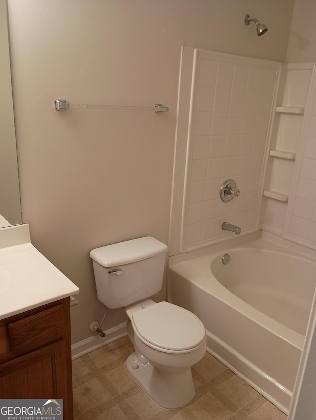 full bath featuring shower / bathtub combination, toilet, vanity, baseboards, and tile patterned floors